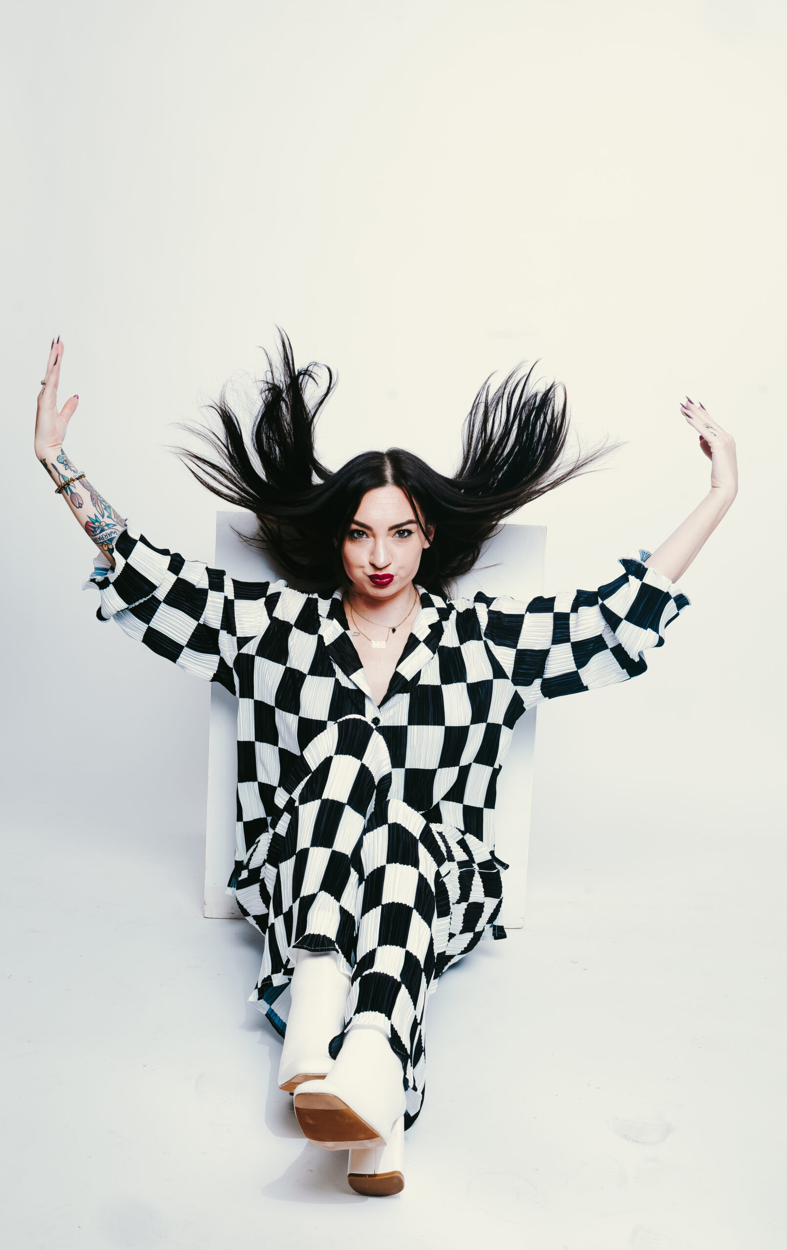 a san antonio photographer poses for a headshot