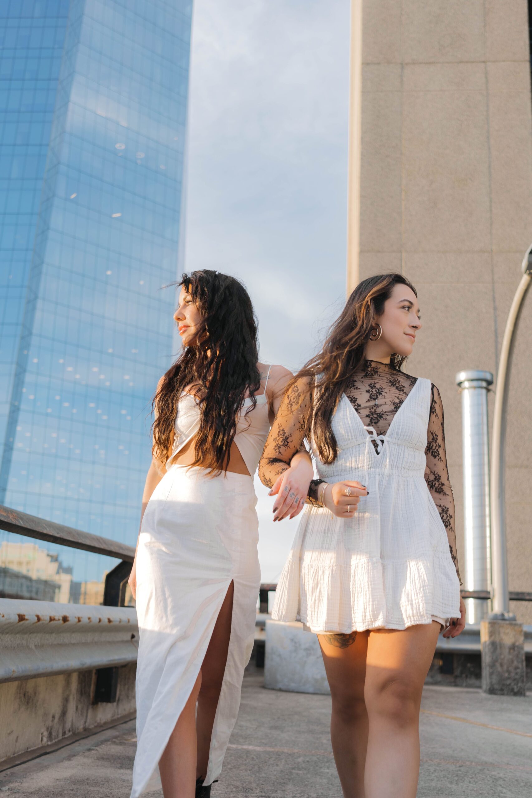 two female hair stylists pose for a brand photo headshot