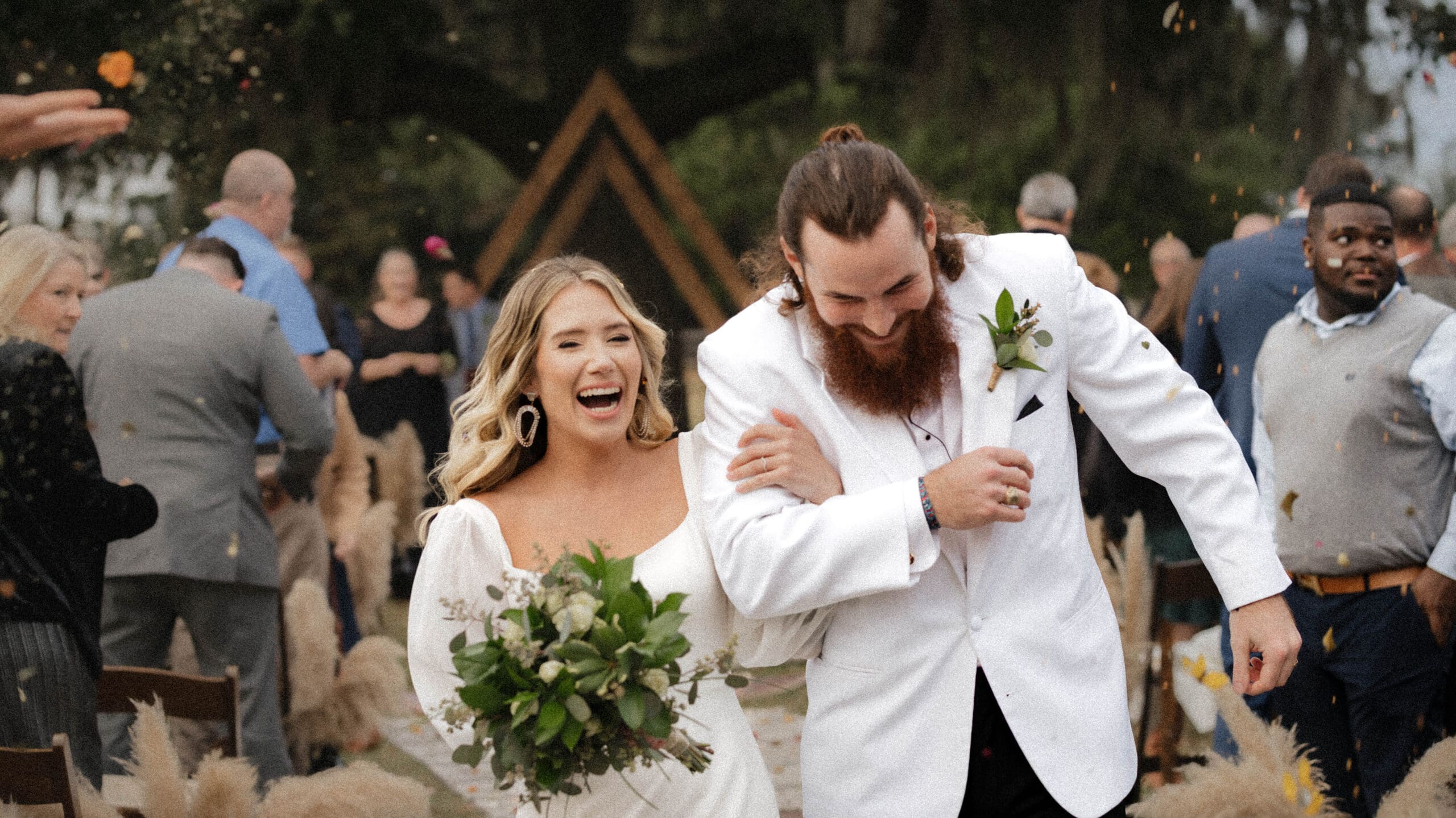 a san antonio texas bride and groom walk down the aisle as a married couple