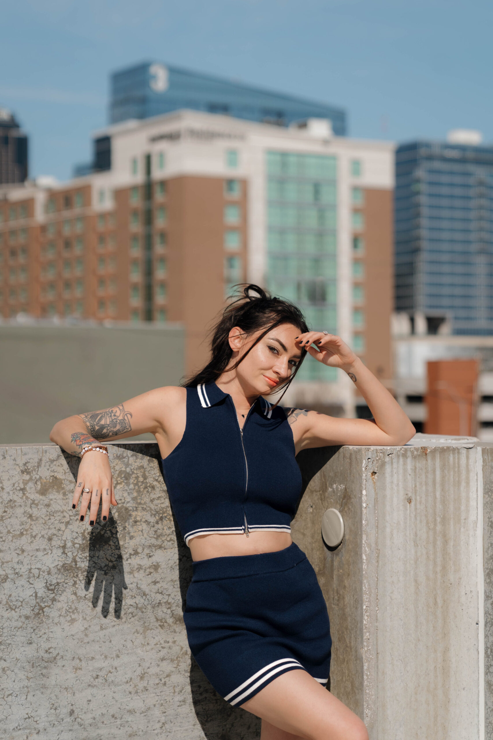 a san antonio photographer poses for a headshot