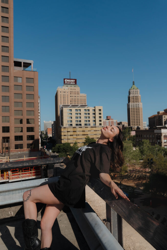 a san antonio photographer poses for a headshot