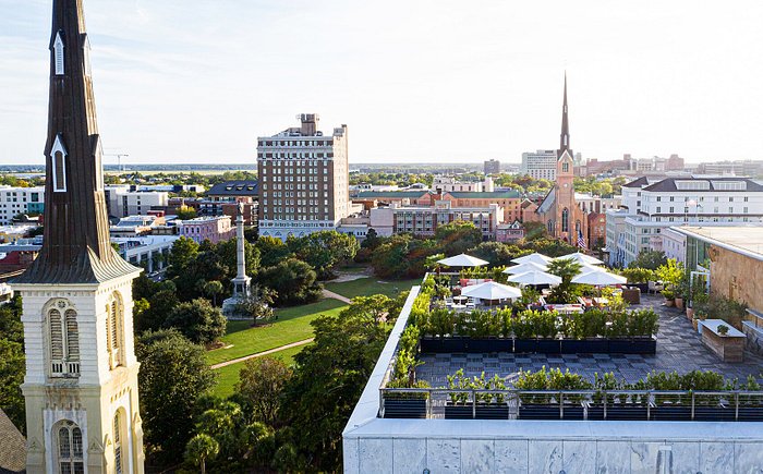 Luxury Charleston SC wedding at The Dewberry with rooftop city views captured by professional wedding photographer