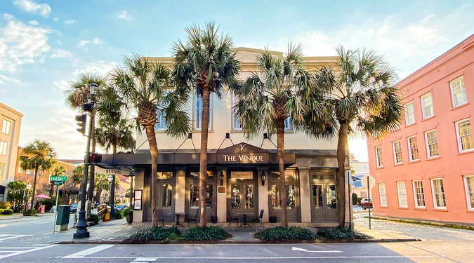 Charleston wedding photographer capturing a rooftop garden ceremony at The Vendue in downtown Charleston SC